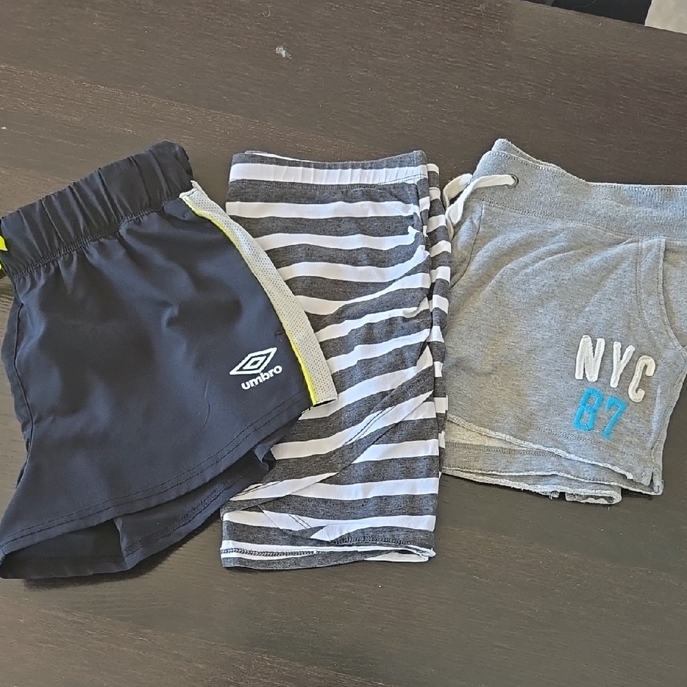 Umbro Black Shorts, Striped Gray Skirt & gray shorts.